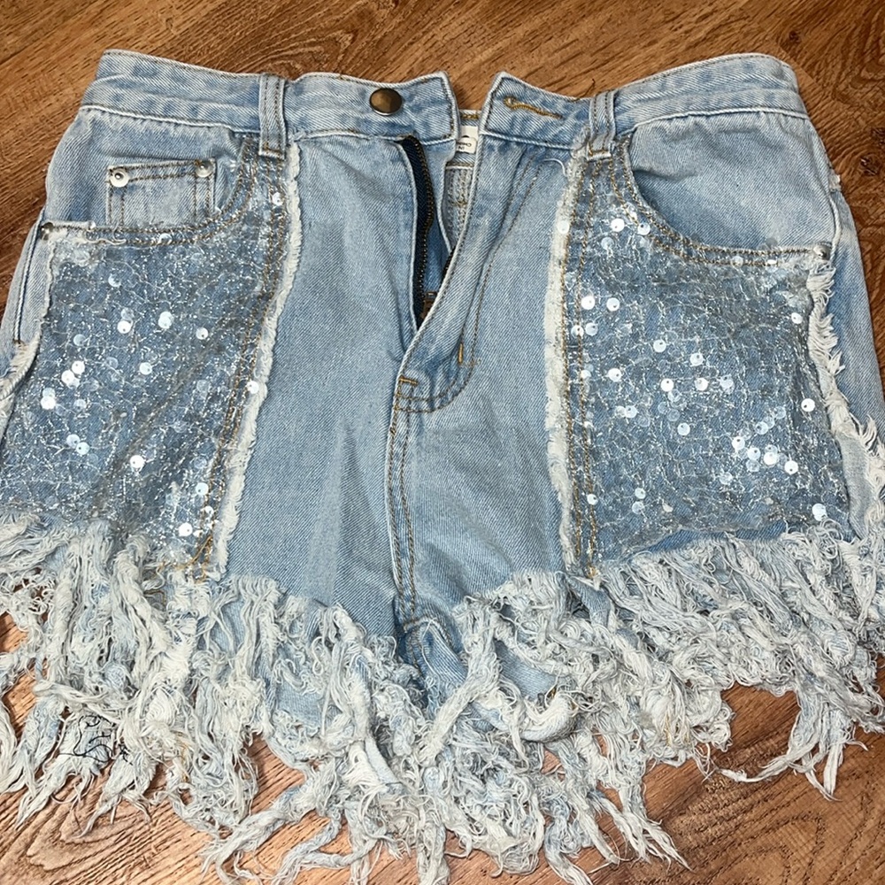 Jean shorts with sparkles and fringe